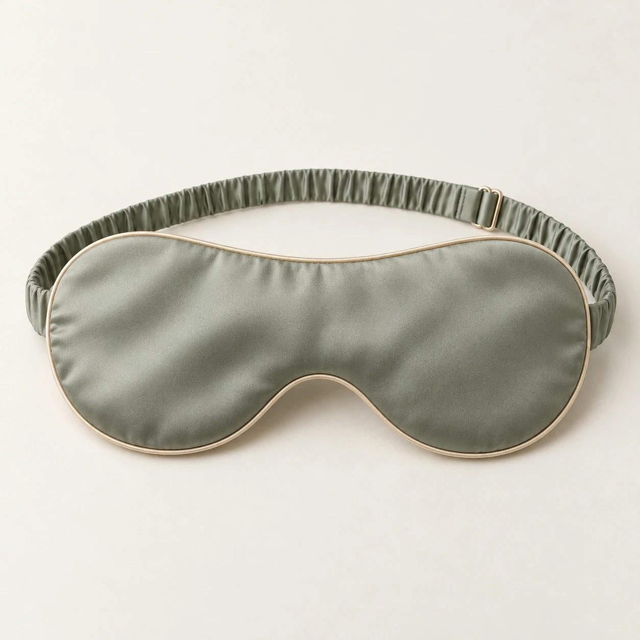 Sage Reverie silk eye mask in Sage / Champagne